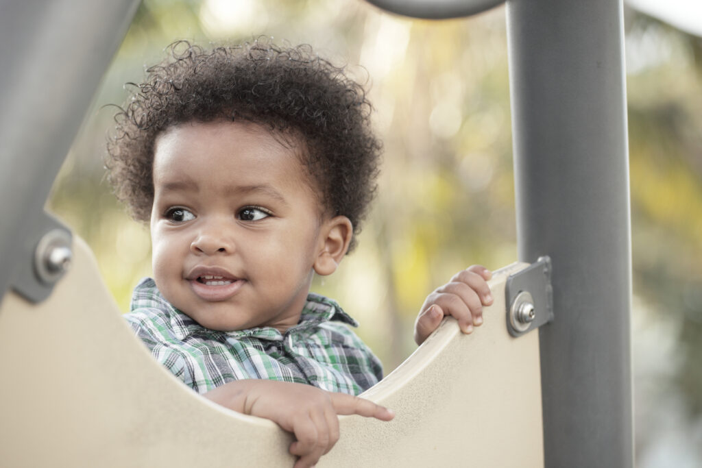 Little boy playing in the playground